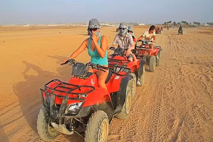 ATV quad bike convoy across Sharm El Sheikh desert sands on the Echo Mountain adventure tour