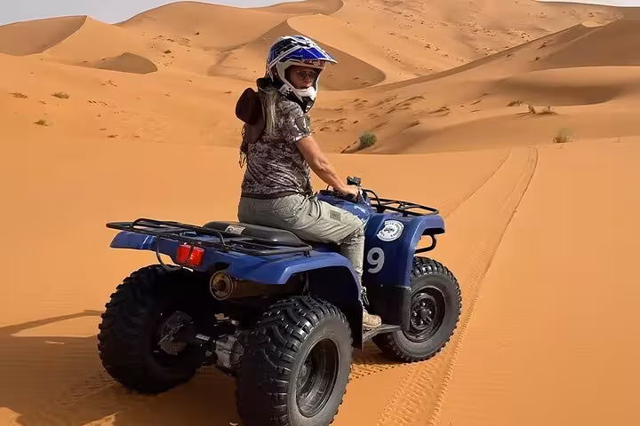 ATV quad biking across Sinai desert dunes on Sharm El Sheikh water sports and desert adventure tour