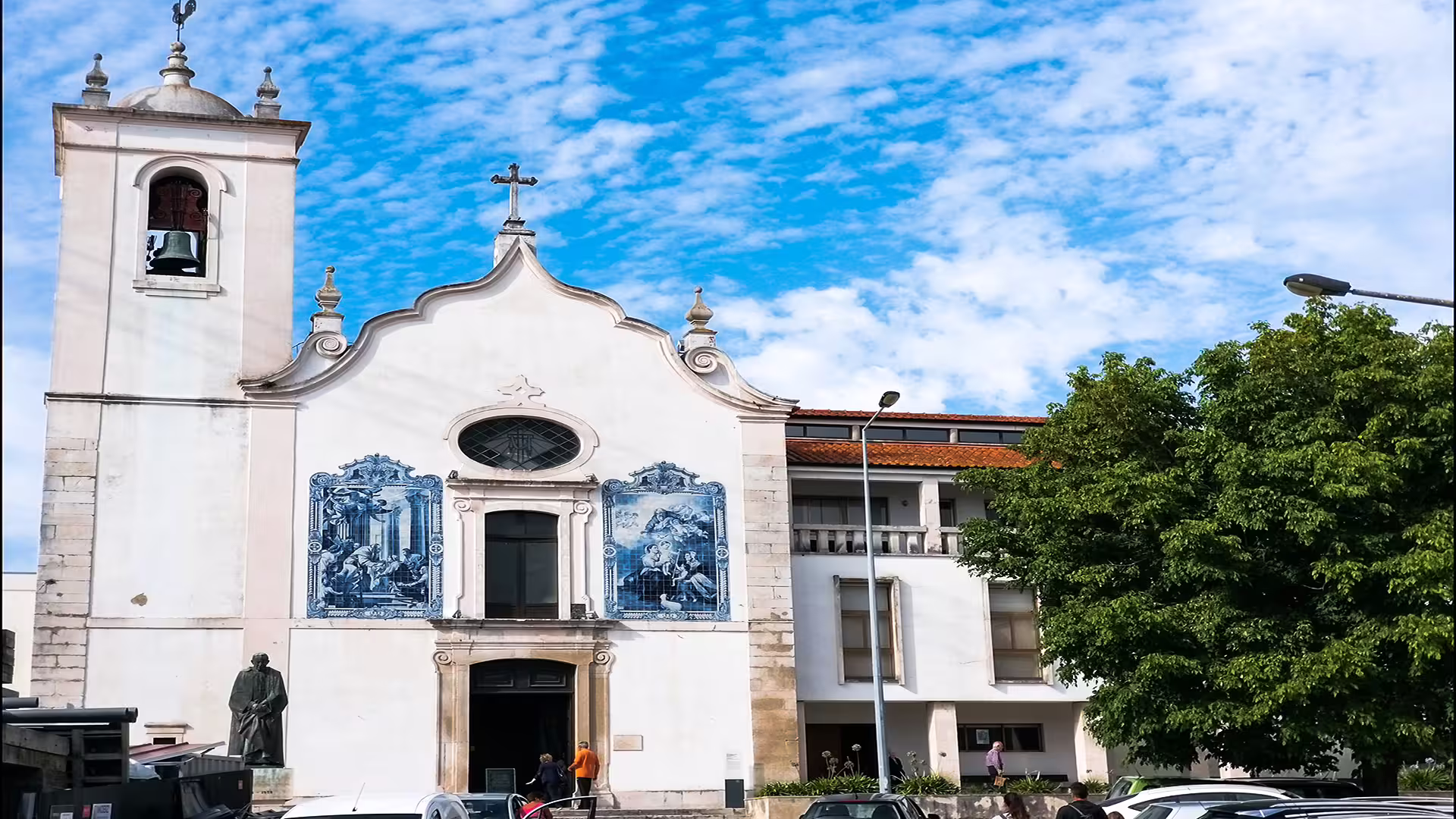 Historic church with azulejo tiles in Aveiro, Portugal, showcasing unique architecture on a sunny day during a private tour.