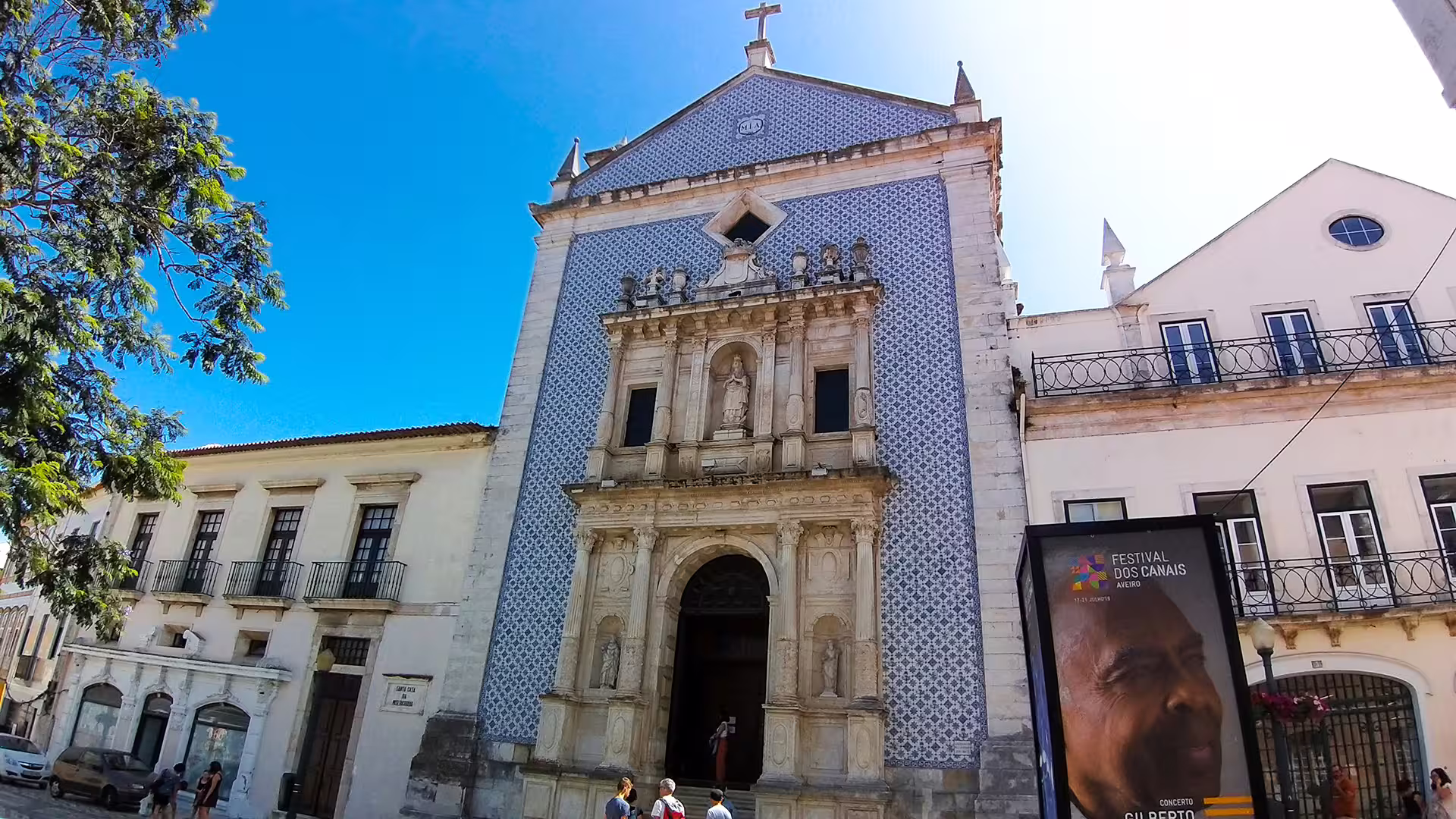 Historic church facade in Aveiro with blue azulejos tiles, perfect for a private tour exploring architectural wonders.