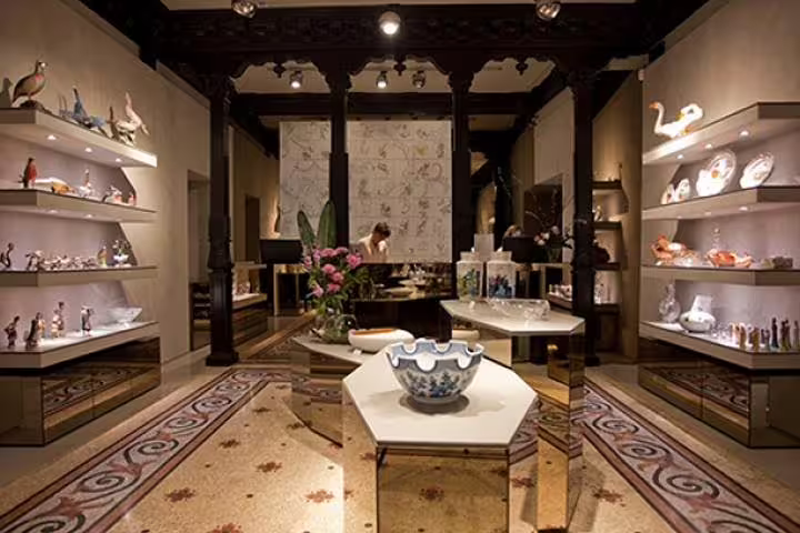 Elegant showroom in Aveiro showcasing traditional Portuguese ceramics during a private tour from Lisbon to Ilhavo.