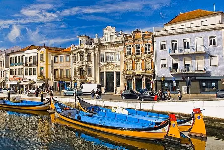 Aveiro canal with colorful moliceiro boats on Lisbon to Porto or Porto to Lisbon tour transfer, Portugal