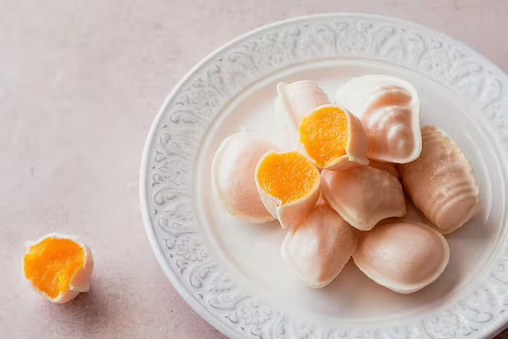 Indulge in Aveiro's traditional ovos moles, a sweet treat featured on the Private Full-Day Tour from Porto.