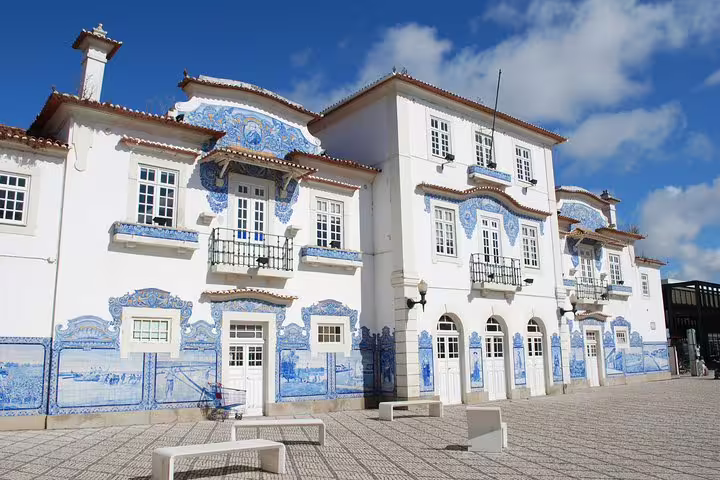 Historic train station in Aveiro adorned with traditional Portuguese azulejos, a highlight of the river cruise tour.