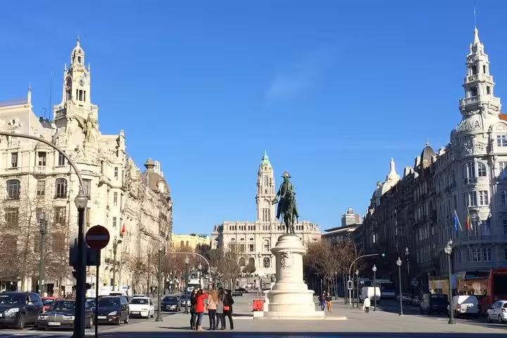 Avenida dos Aliados Porto with statue and City Hall, landmark stop on half-day small-group tasting tour