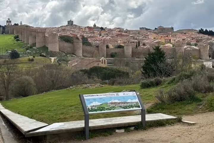 Panoramic view of Avila city walls from scenic lookout on half-day private minivan tour in Castilla y Leon