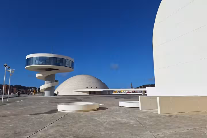 Modern architecture of Avilés Cultural Center under a clear blue sky, featured in Cudillero and Aviles tour.