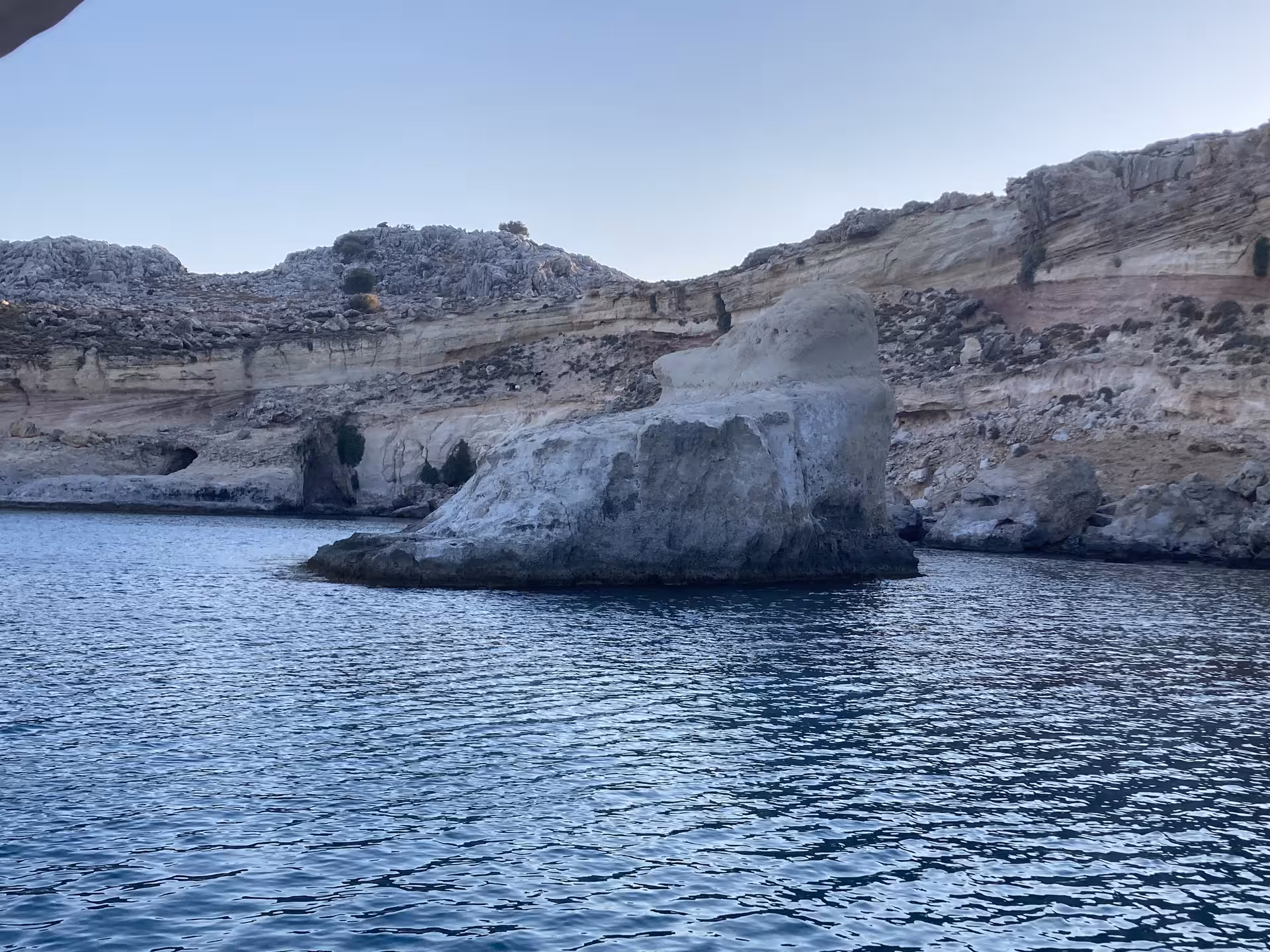 Limestone sea stack and rocky cove scenery on Discover Emerald Islets Axopar 25 CT island-hopping tour
