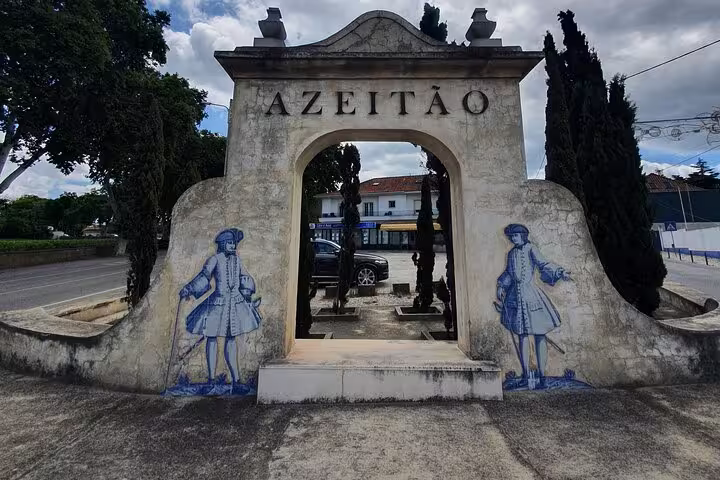 Historic Azeitão gateway adorned with blue tiles, a highlight on the Arrábida, Azeitão, Setúbal & Palmela tour.