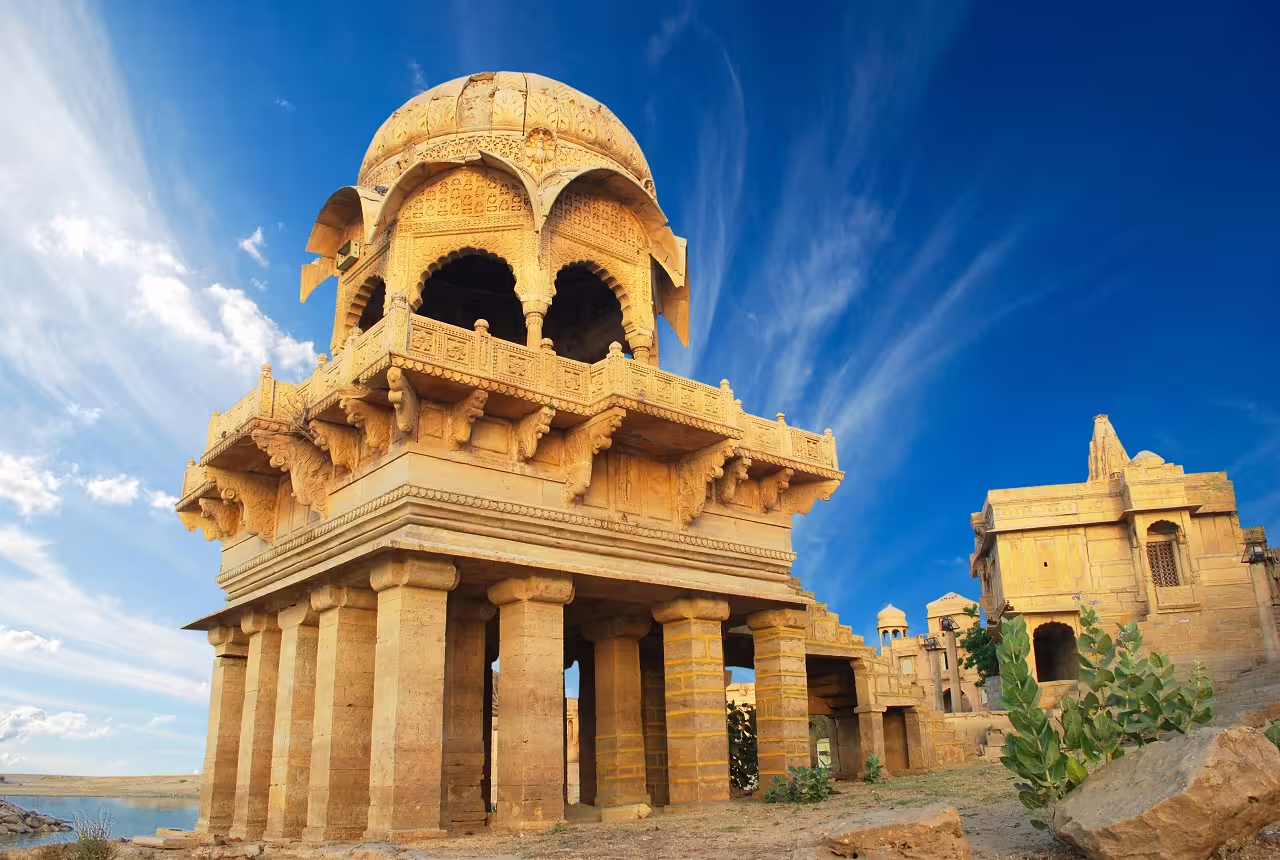 Explore the stunning architecture of Bada Bagh cenotaphs in Jaisalmer on a complete Rajasthan 14-day tour.
