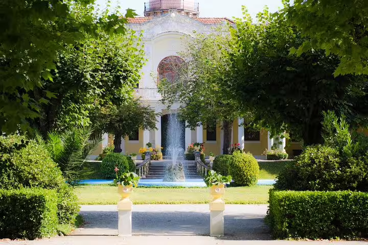 Discover the lush gardens and elegant architecture of Curia village on our exclusive Bairrada Tour.