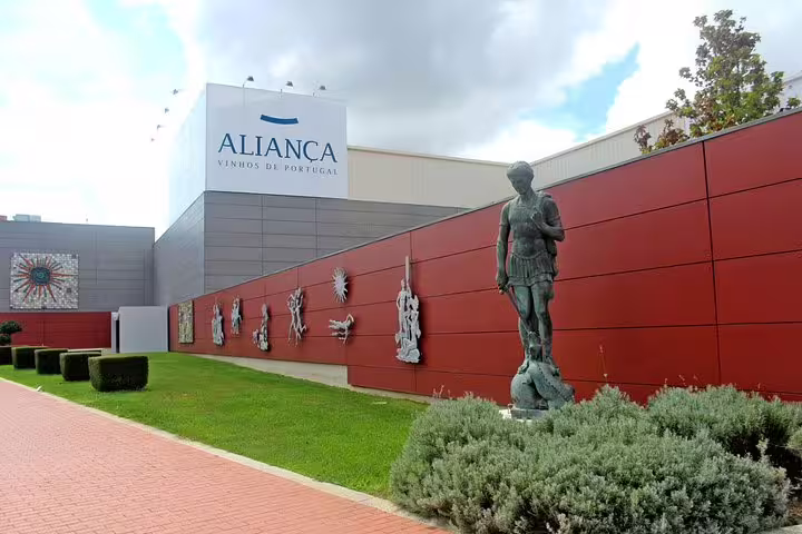 Explore Aliança Vinhos de Portugal, featuring art sculptures and modern architecture on our Bairrada Tour.