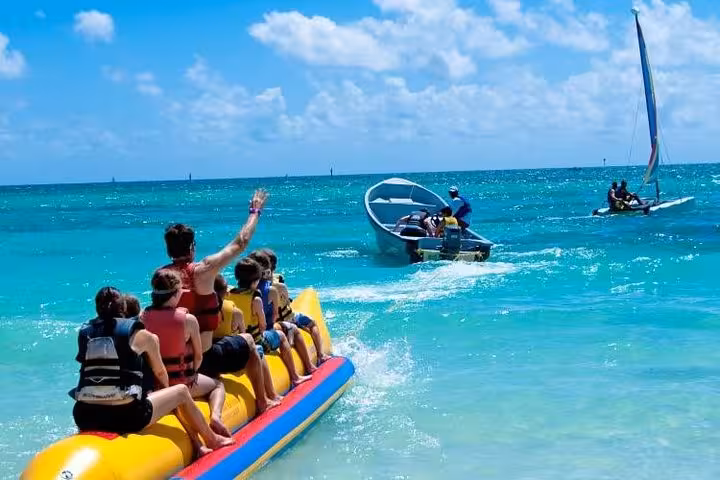 Banana boat fun in turquoise Red Sea waters on a private boat trip from Hurghada to El Gouna and Safaga