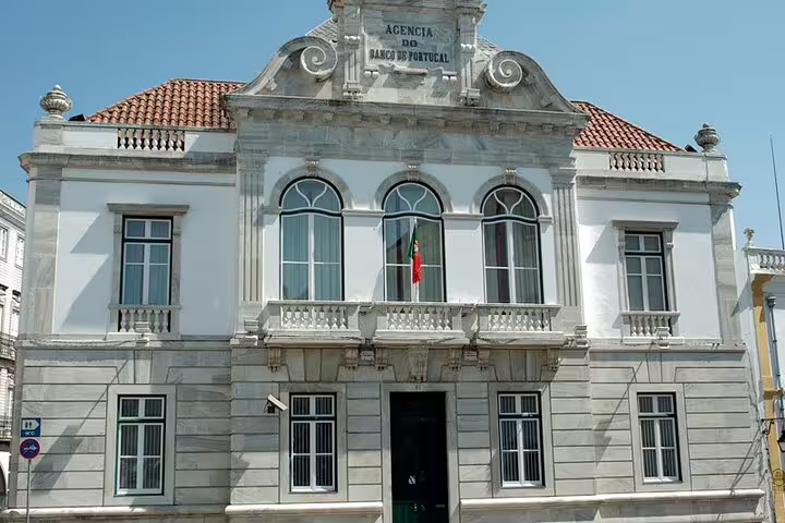 Historic Banco de Portugal building facade in Evora, seen on a self-guided GPS audio walking tour