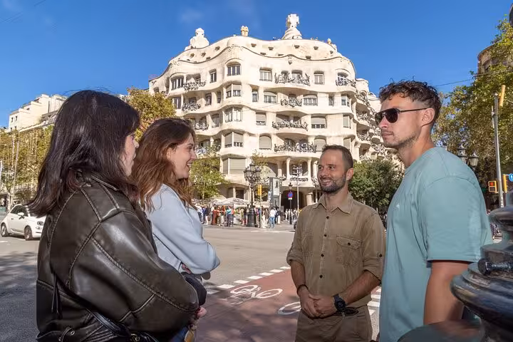 Small group with guide at Casa Milà (La Pedrera), exploring Barcelona Modernist architecture on foot