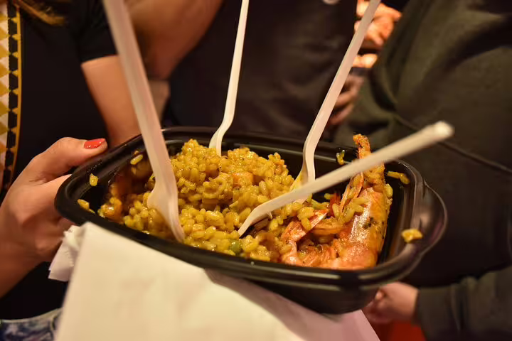 Close-up of a traditional Spanish paella with seafood, enjoyed during a Barcelona food tasting tour.