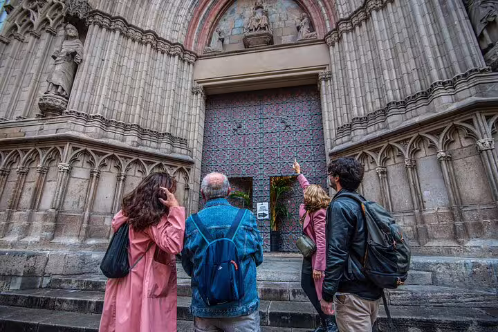 Visitors admiring the detailed facade of a historic Barcelona cathedral, a key stop on private city tours.