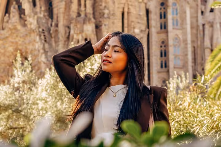 Lifestyle portrait at Sagrada Família, Barcelona, captured in golden light for a Gaudí-inspired professional photoshoot.