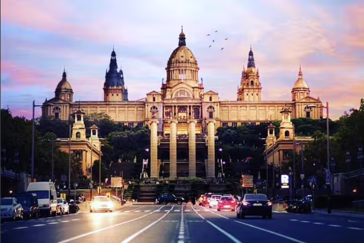 Stunning view of the National Art Museum of Catalonia at sunset, a highlight of the Semi-Private Barcelona Tour.