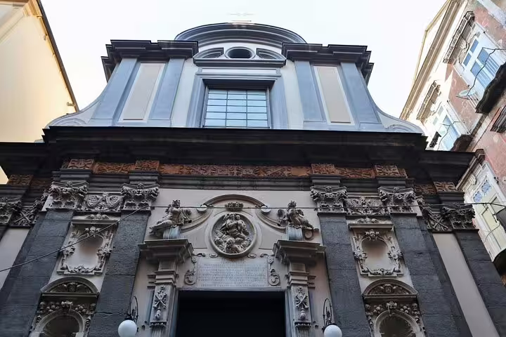 Baroque church façade in Naples visited on the Legends of Naples saints and secrets walking tour