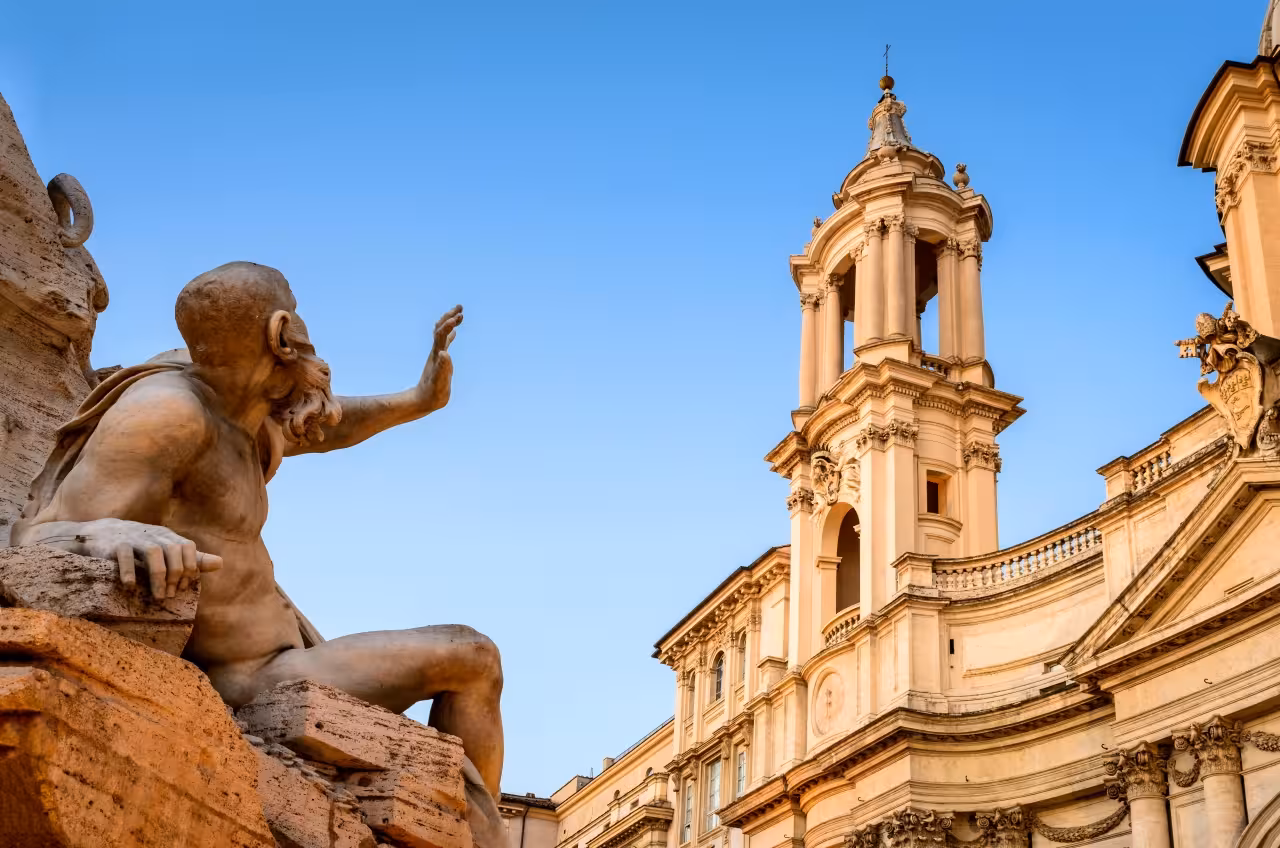 Fontana dei Quattro Fiumi statue and Sant’Agnese in Agone facade on a Baroque Rome guided tour