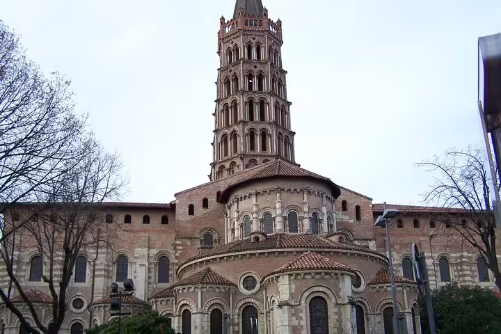 Basilique Saint-Sernin in Toulouse on a self-guided e-scavenger hunt, discover landmarks at your own pace