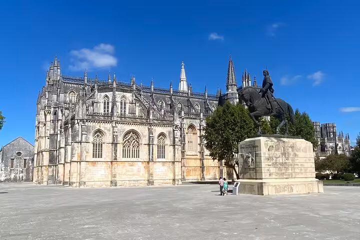 The stunning Gothic architecture of Batalha Monastery, featured on the Lisbon to Fátima/Batalha/Nazaré & Óbidos tour.