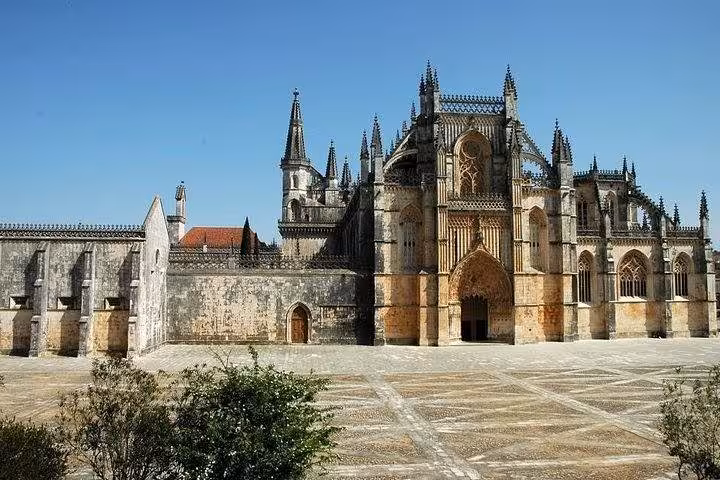 Batalha Monastery's intricate Gothic facade, perfect for exploring on a private tour in Portugal.