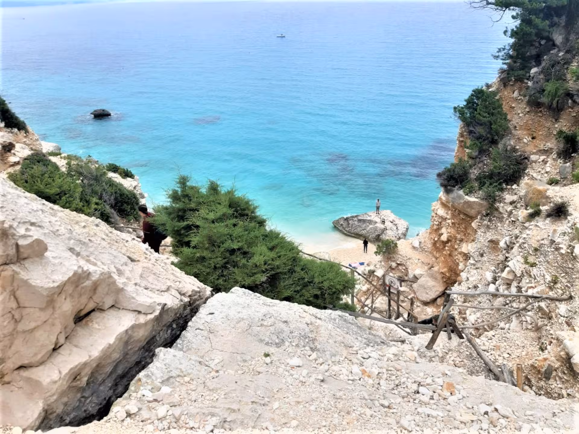 Stunning view of Cala Goloritzè's turquoise waters and rocky cliffs on a Baunei trekking adventure.