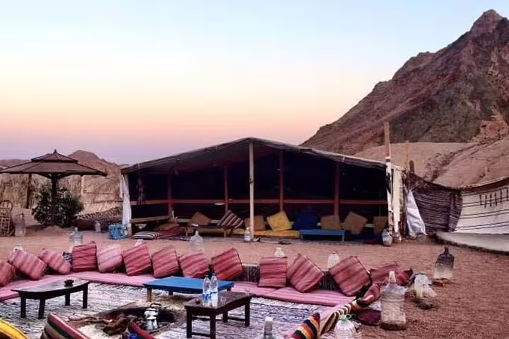 Bedouin desert camp lounge at sunset, part of Marsa Alam Jeep safari adventure with dinner and show