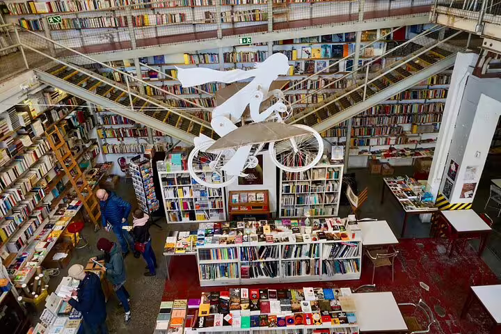 Vibrant bookstore in Belem with diverse book collections and unique decor, a highlight of the Belem Private Day Trip tour.
