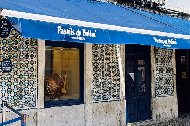 Historic Pastéis de Belém shopfront with iconic blue tiles, a must-see on your private Belem tour in Lisbon.