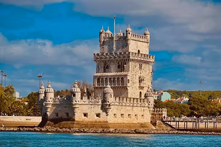 Belém Tower on the Tagus River, iconic Lisbon landmark seen on tuk-tuk sightseeing tour before 2-hour sunset sail