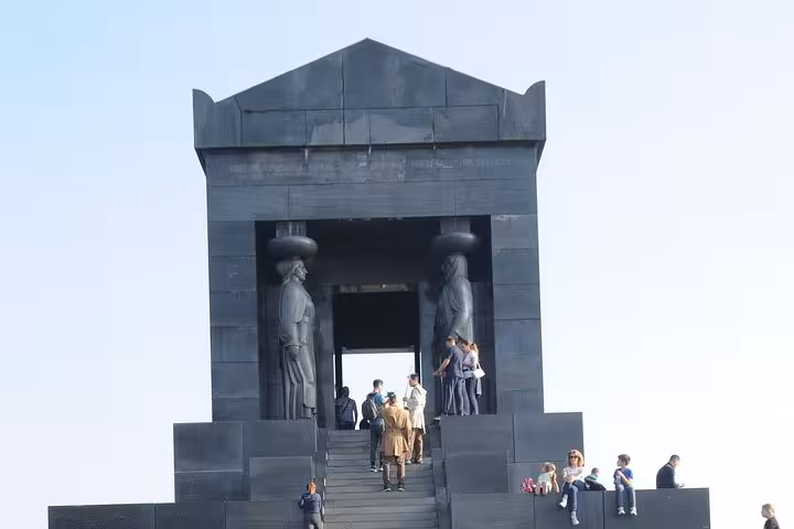 Visitors explore the Monument of Gratitude to France, a key attraction on the Belgrade Big Tour.
