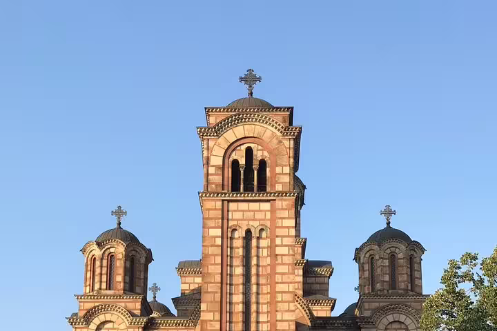Serbian Orthodox church towers in Belgrade linked to Russian White émigrés, featured on Russian Revolution tour