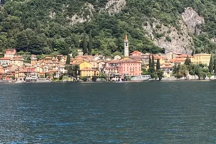 Bellagio waterfront skyline on Lake Como seen from cruise boat, scenic stop on Milan day trip tour