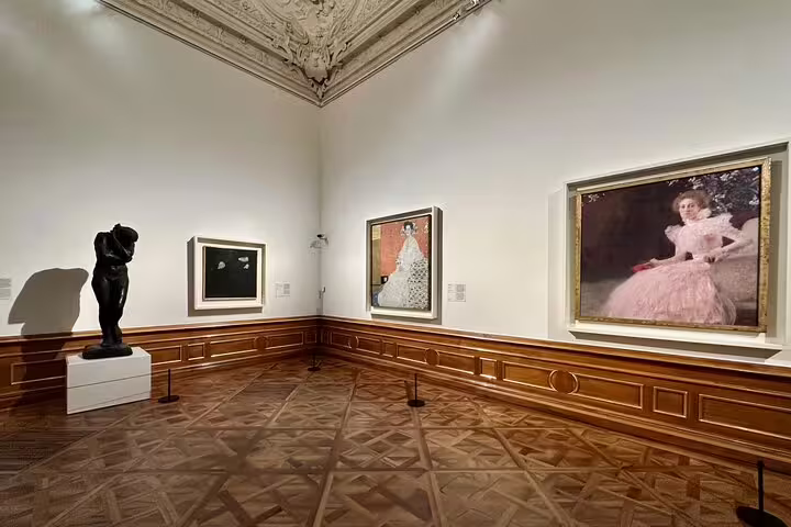 Elegant gallery room at Belvedere displaying Gustav Klimt's works, perfect for a themed tour with an art historian.