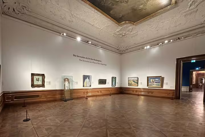 Elegant gallery room in the Belvedere Museum showcasing Viennese Secession artworks, ideal for art history tours.