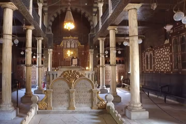 Ben Ezra Synagogue sanctuary view in Coptic Cairo, ornate bimah and columns on Muizz Street and bazaar day tour