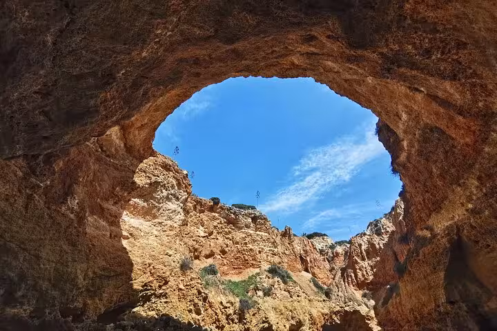 Benagil Cave Algarve skylight view on private Lisbon day tour with scenic boat trip to sea caves