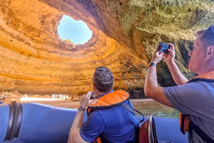 Boat tour inside Benagil Cave with skylight, Algarve day trip on all-inclusive private tour from Lisbon