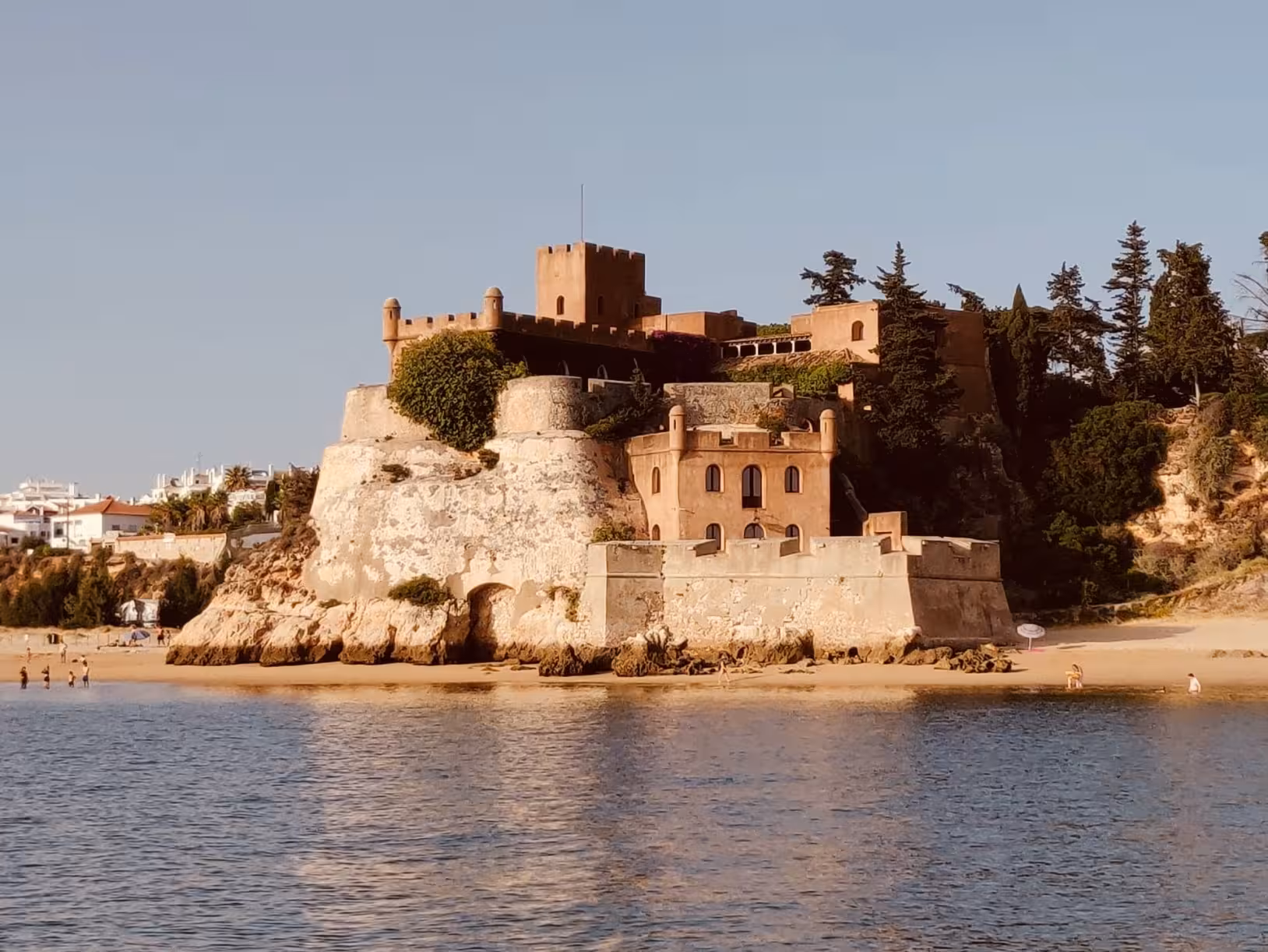 Explore a stunning coastal castle on a private beach tour in Algarve, Portugal, offering historic charm and scenic views.