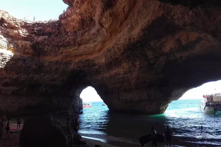 Explore the stunning Benagil caves on a private Algarve tour from Lisbon, featuring a scenic boat trip and breathtaking coastal views.