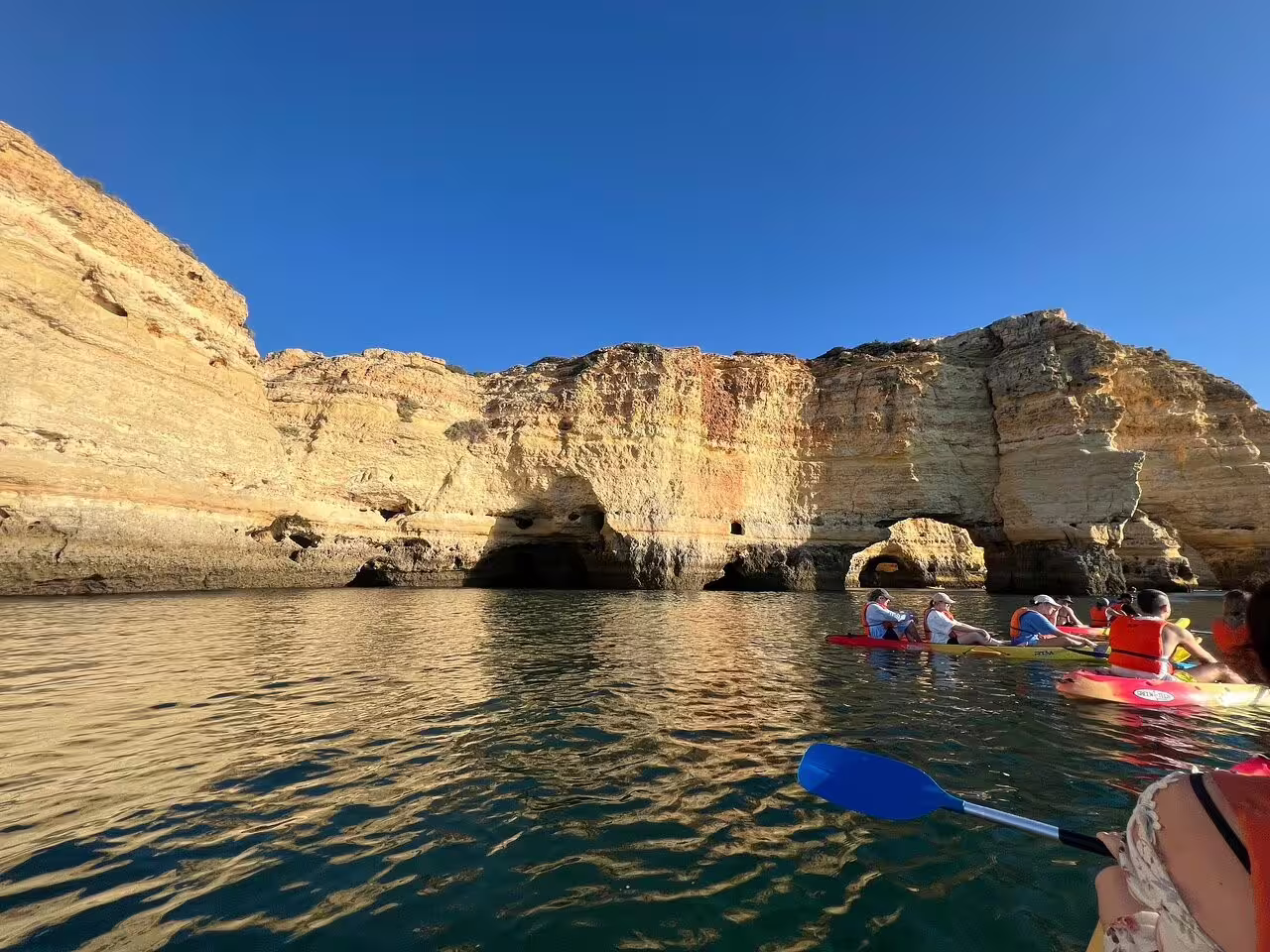 Join a small group on a guided Benagil kayak tour, experiencing the majestic Algarve coastline and its natural rock formations.