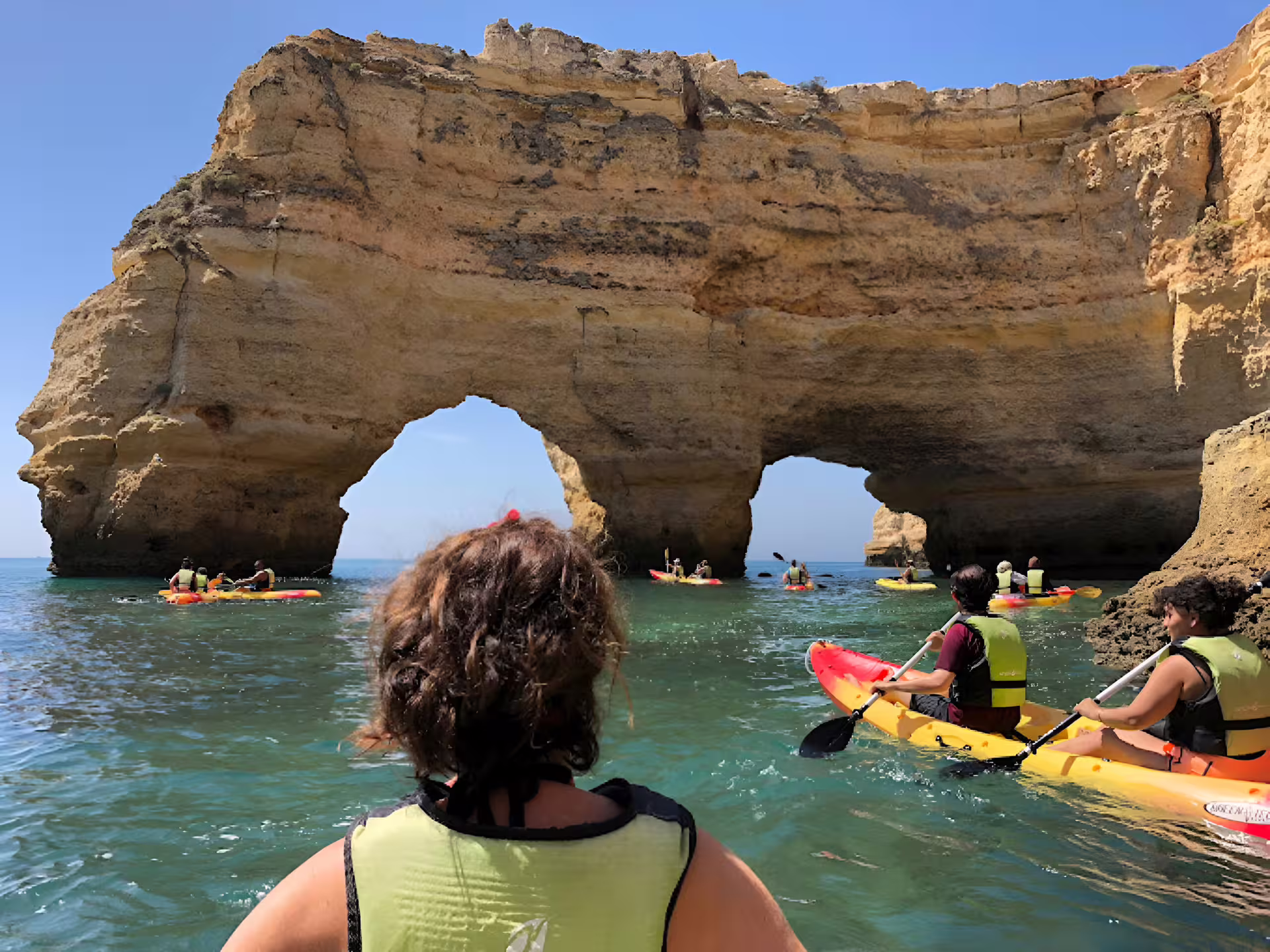 Join a guided Benagil kayak tour, marveling at impressive rock formations in a small group with quality equipment.
