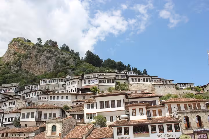 Panoramic view of Berat's traditional Ottoman-style houses, highlighting the cultural charm on a food and wine tour.
