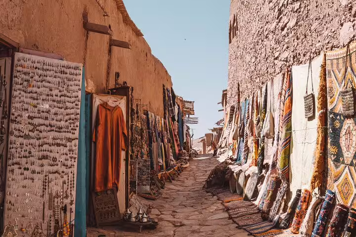 Traditional Berber market alley with rugs and crafts on the 3 days desert tour from Fes to Marrakech