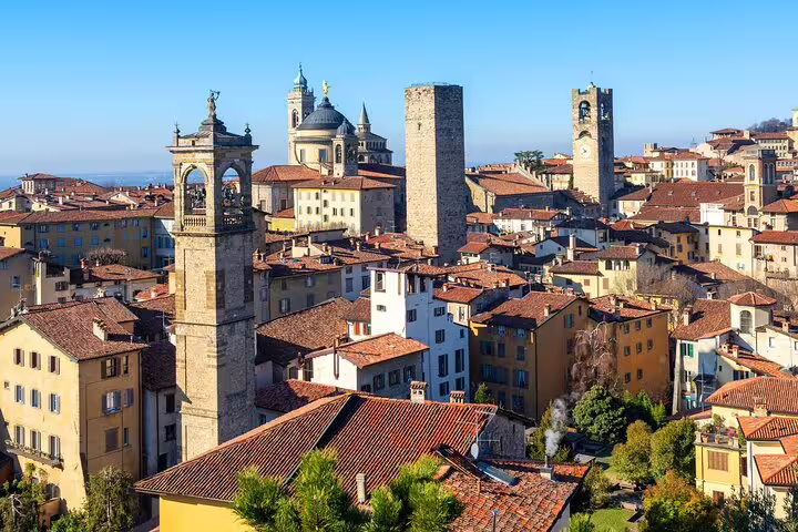 Panoramic view of Bergamo Città Alta rooftops and towers, key stops on a self-guided scavenger hunt tour
