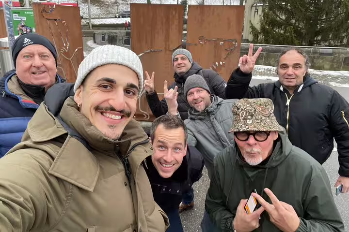Group selfie during Bern scavenger hunt and sights self-guided tour, solving clues at city landmarks