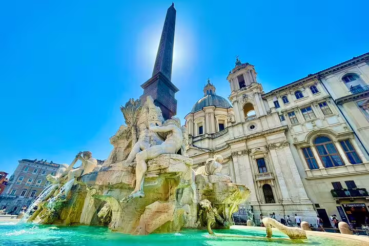 Bernini’s Fountain of the Four Rivers and towering obelisk in Piazza Navona visited on a Best of Rome private walking tour